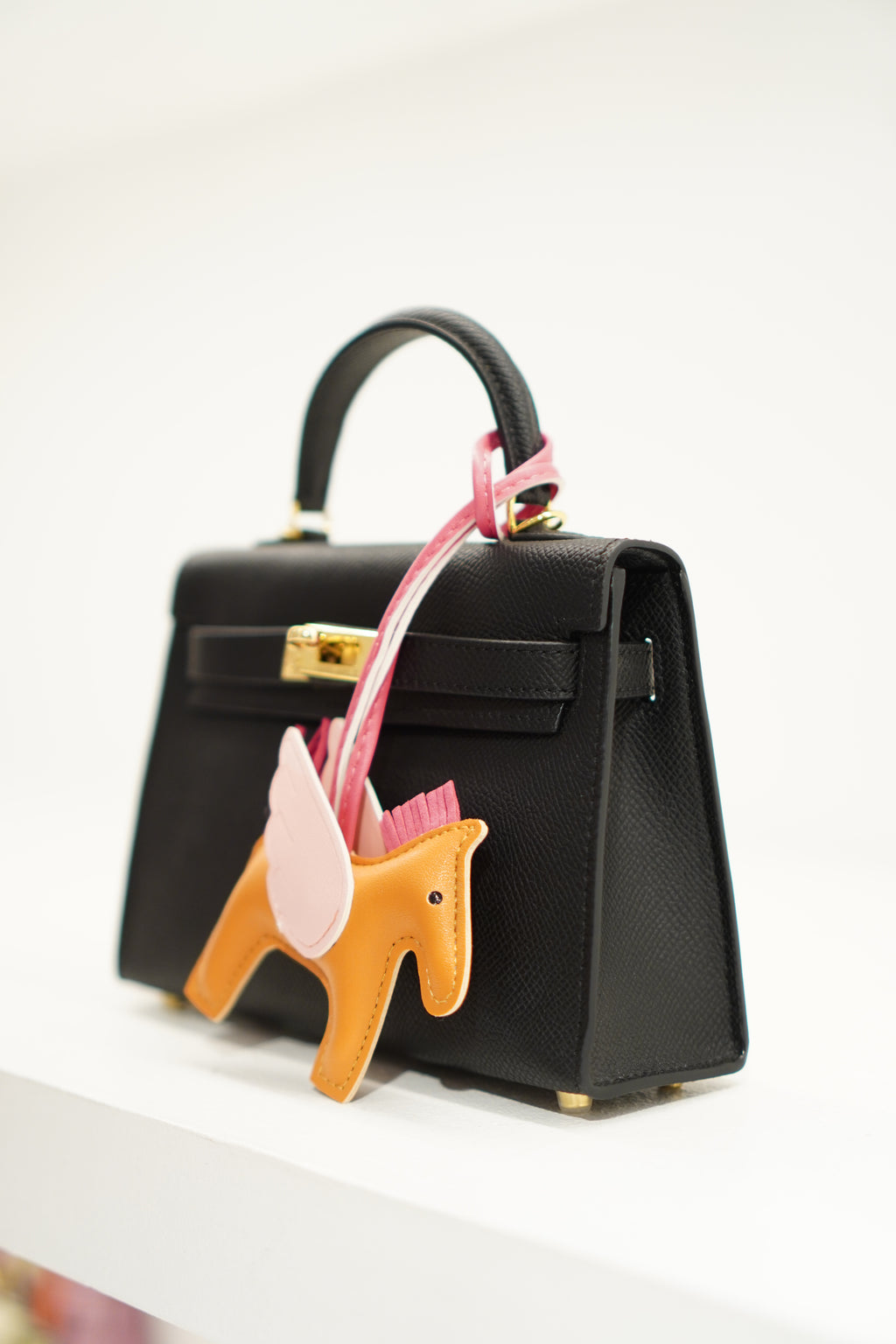 Hermés Kelly Mini